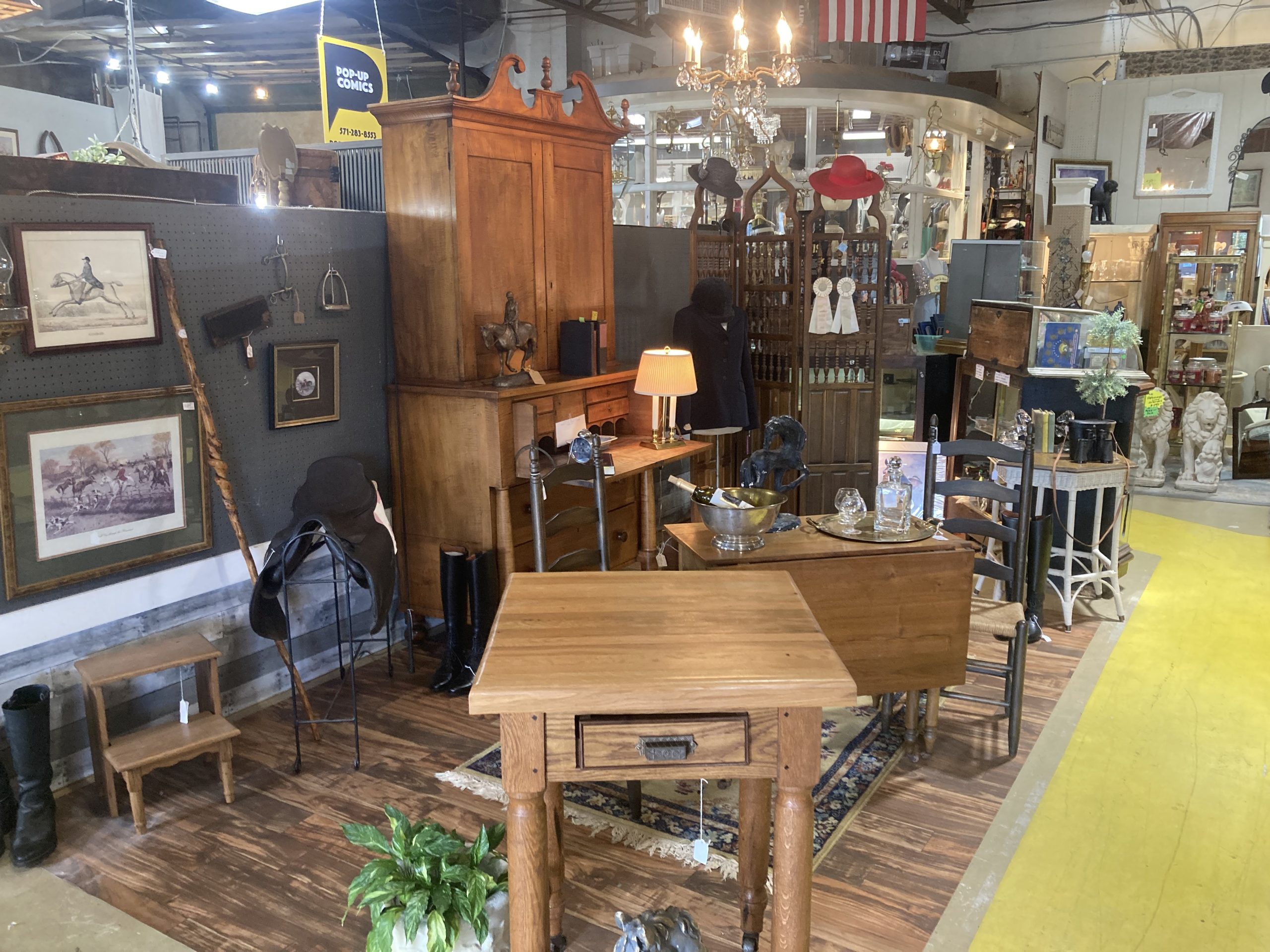 A room filled with antique mall booths and collectibles